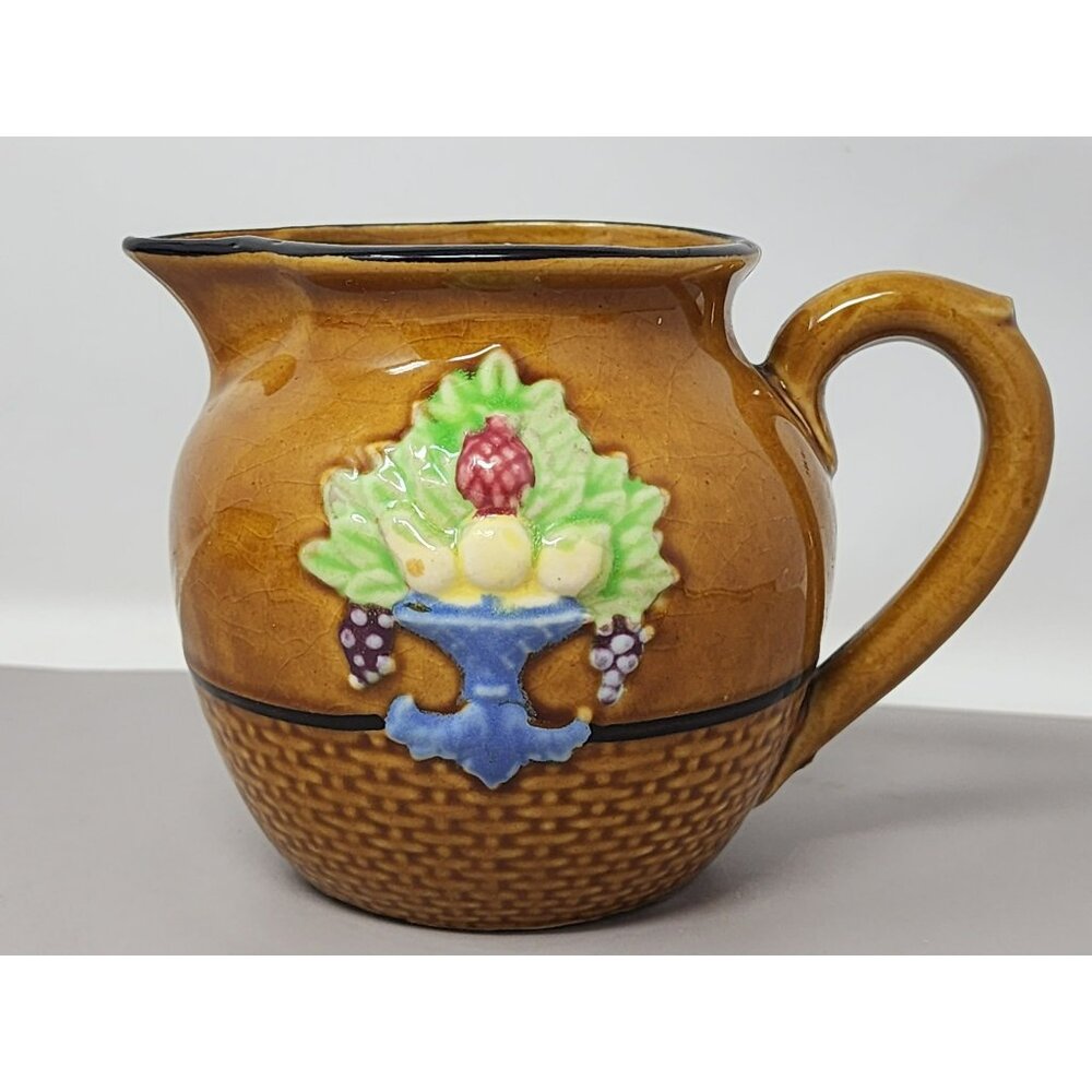 Vintage Japanese Ceramic Pitcher With Embossed Fruit Design & Handle‎